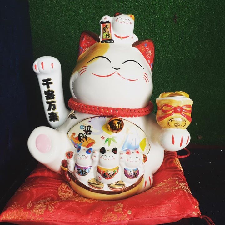 Mèo ngoắc cầm hũ vàng Giá bán: 1.500.000đ