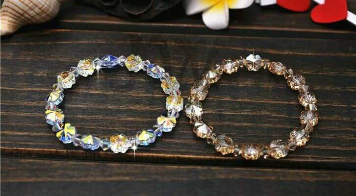 LT003_Lắc tay pha lê cỏ 4 lá màu trà Giá bán: 309.000đ