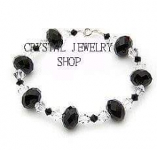 LT038 - Lắc tay pha le hat bánh cam đen trắng